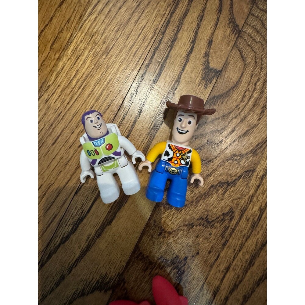 LEGO DUPLO Toy Story figures featuring Buzz Lightyear and Woody, original